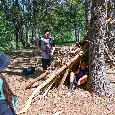 students building a shelter